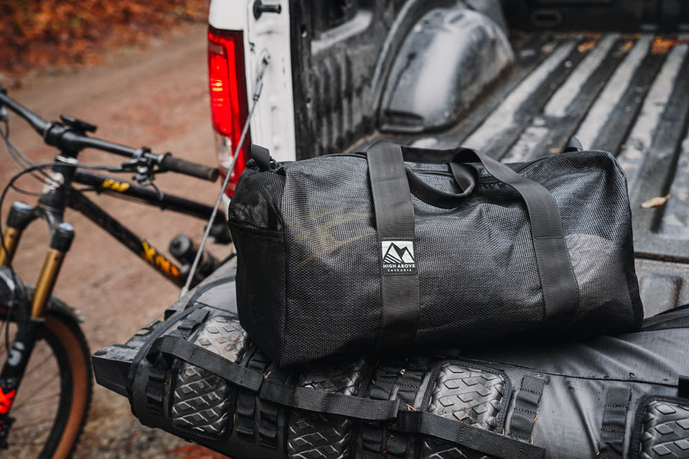 High Above Lost Lake Duffel Bag In bed of pickup truck.
