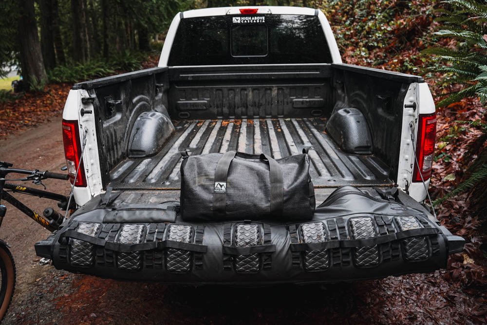 High Above Lost Lake Duffel Bag in bed of pickup truck.