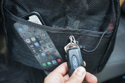End pocket of High Above Lost Lake Duffel Bag with phone and keys on key clip