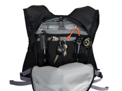 Interior of High Above Supernatural Hydration Vest Pack showing pump storage, key clip , and tool pockets.