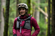 Front view of woman wearing High Above Supernatural Hydration Vest Pack