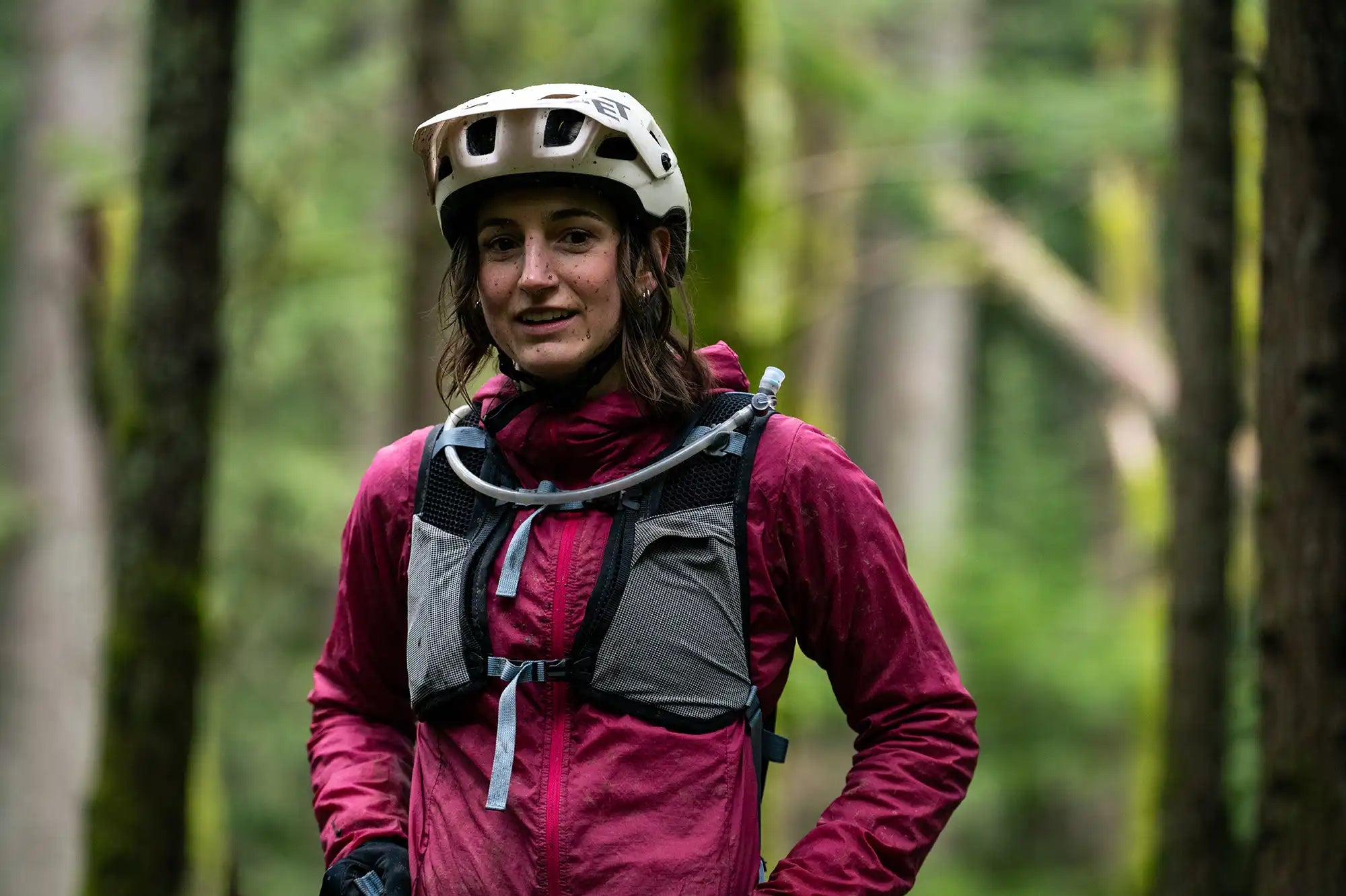Front view of woman wearing High Above Supernatural Hydration Vest Pack