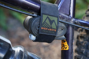 High Above Dark Matter Tube Strap with tube mounted on bike.