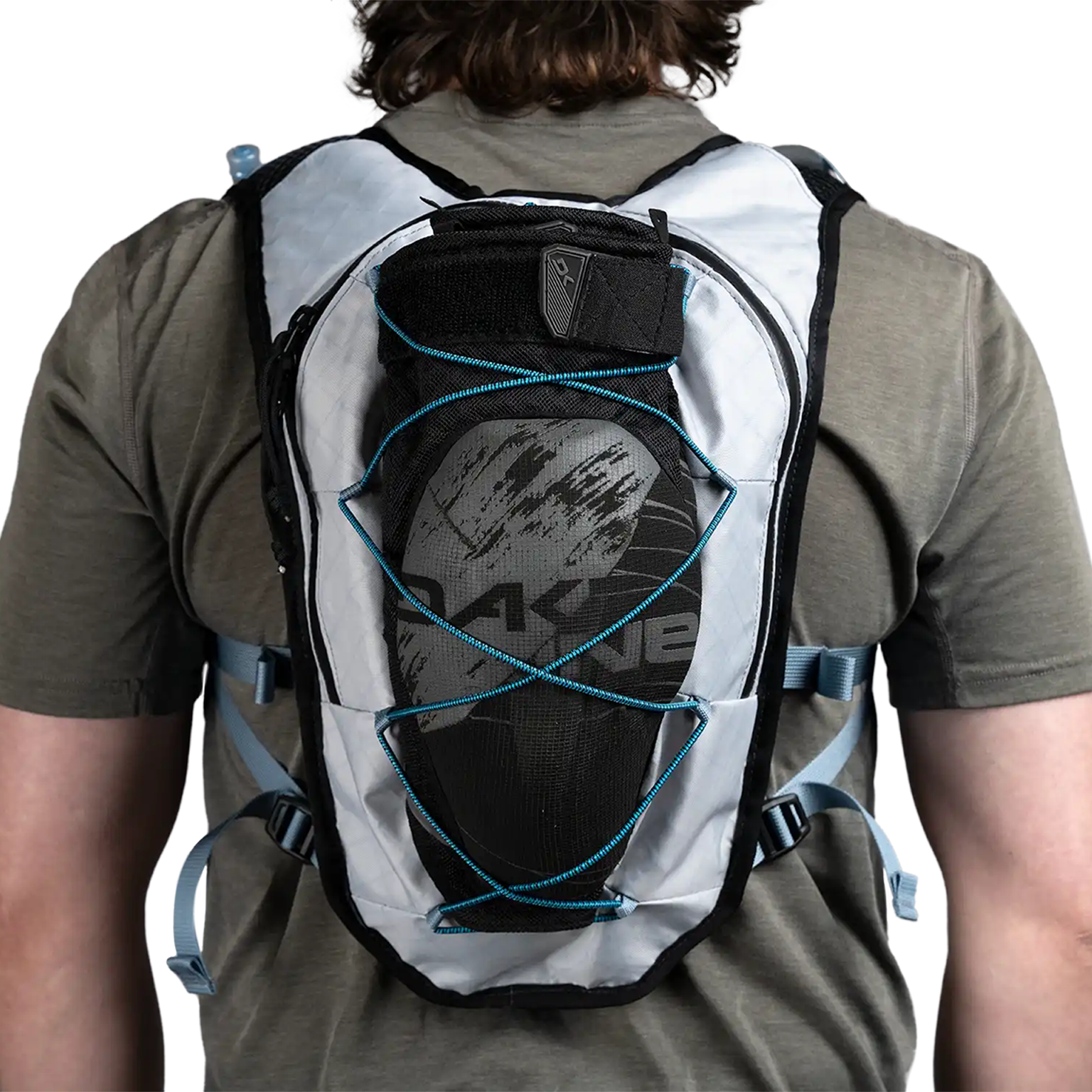 High Above Supernatural Mountain Biking Pack back holding mountain biking knee pads